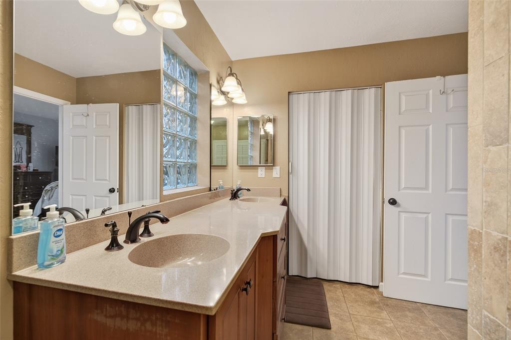 2218 River Ridge Road DeLand, FL 32720 - Photo 21 of 52 a bathroom with a sink and a mirror