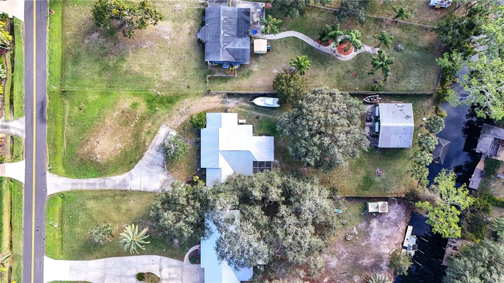 2218 River Ridge Road DeLand, FL 32720 - Photo 37 of 52 an aerial view of residential house with outdoor space and swimming pool