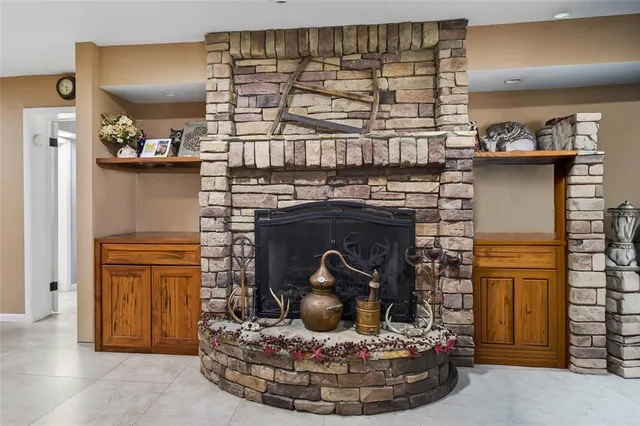 a kitchen with a stove and cabinets