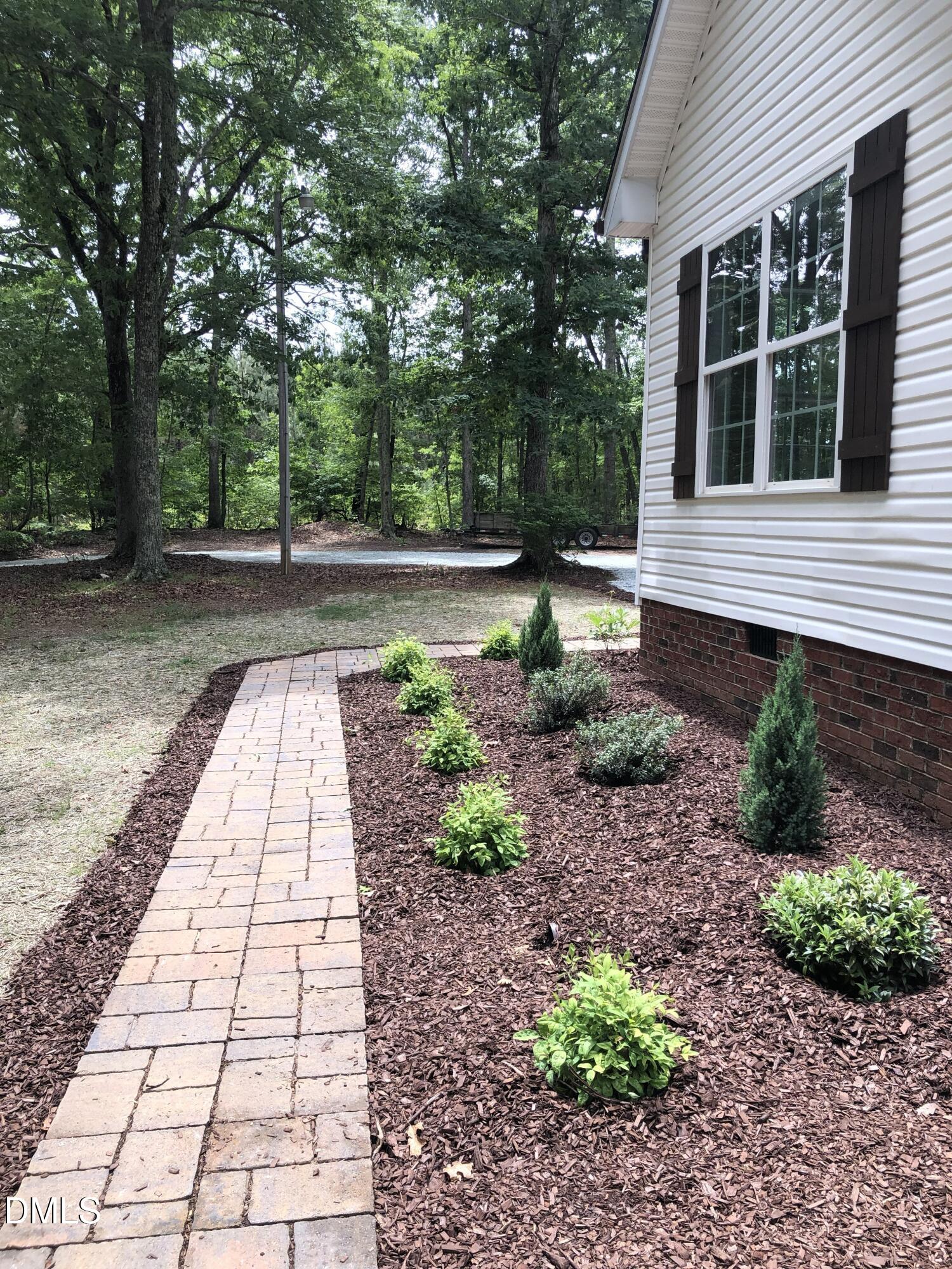 95 Smith Taylor Trail Roxboro, NC 27574 - Photo 12 of 47 a view of a backyard with pathway