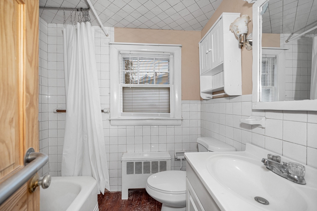 126 Groton Road Chelmsford, MA 01863 - Photo 11 of 38 a bathroom with a sink toilet and shower