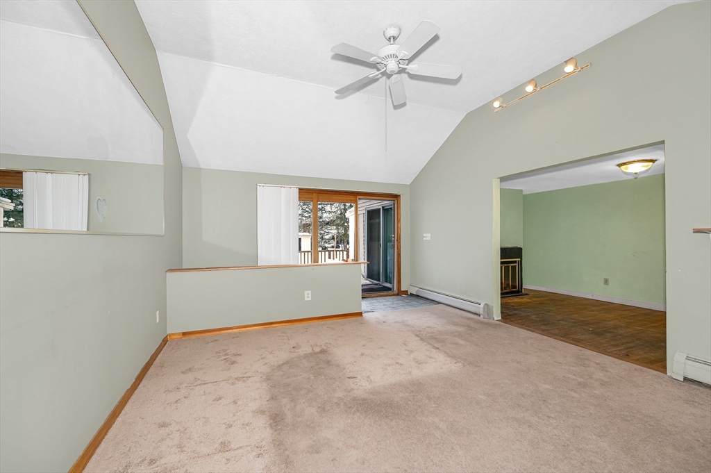 126 Groton Road Chelmsford, MA 01863 - Photo 18 of 38 wooden floor in an empty room with a window