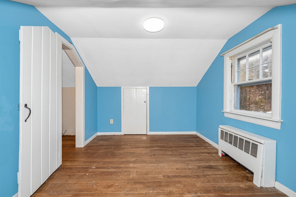 126 Groton Road Chelmsford, MA 01863 - Photo 25 of 38 a view of a hallway with windows