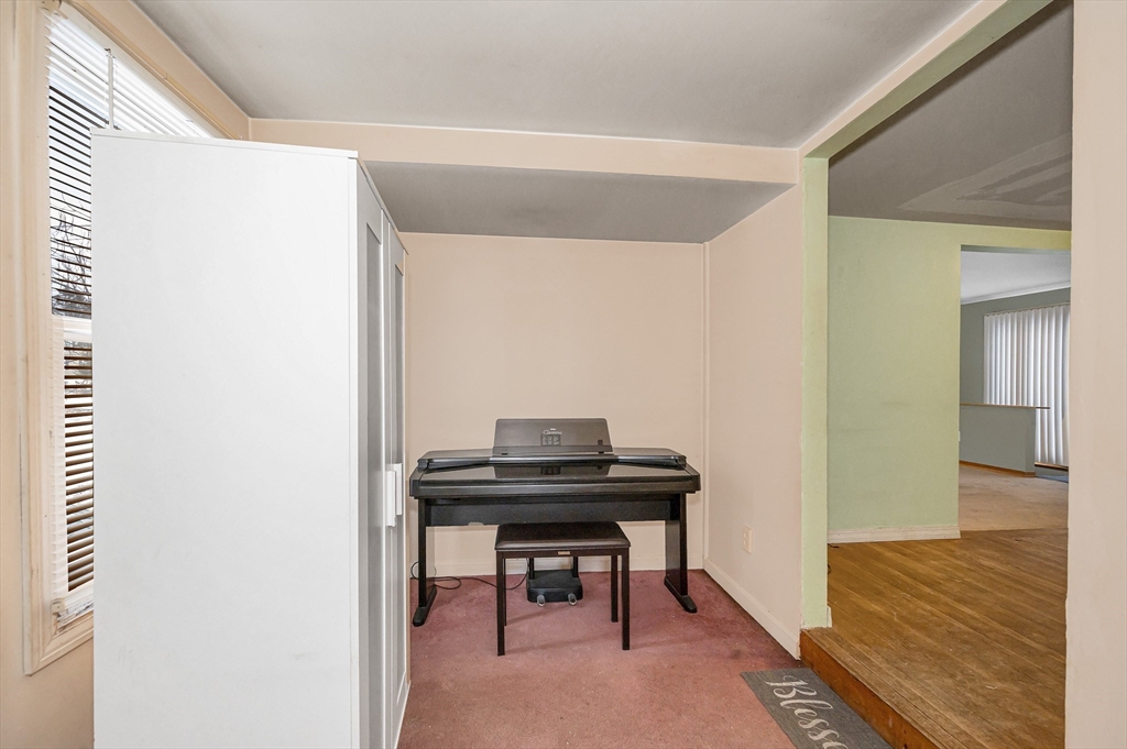 126 Groton Road Chelmsford, MA 01863 - Photo 3 of 38 a view of a workspace with furniture