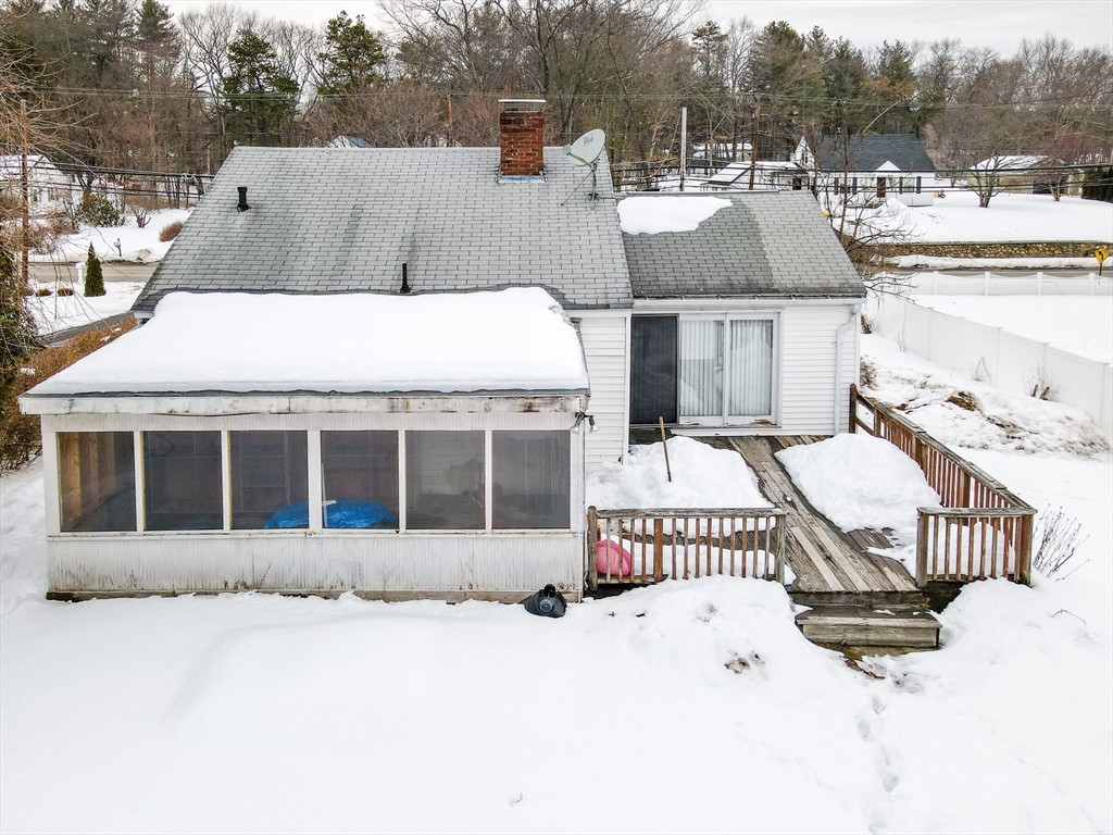 126 Groton Road Chelmsford, MA 01863 - Photo 36 of 38 a view of a house with a park sitting area
