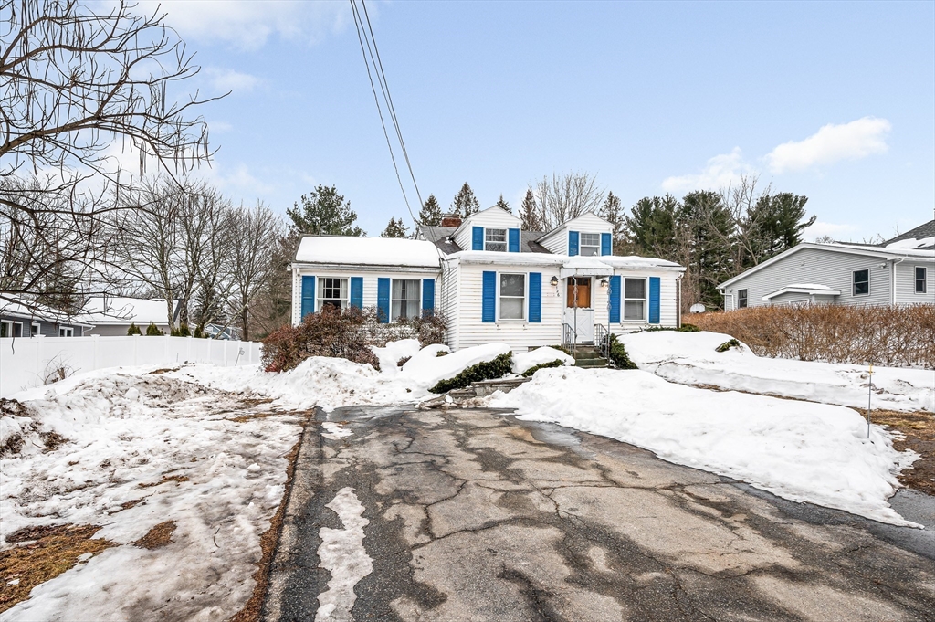 126 Groton Road Chelmsford, MA 01863 - Photo 38 of 38 a view of a yard with a house