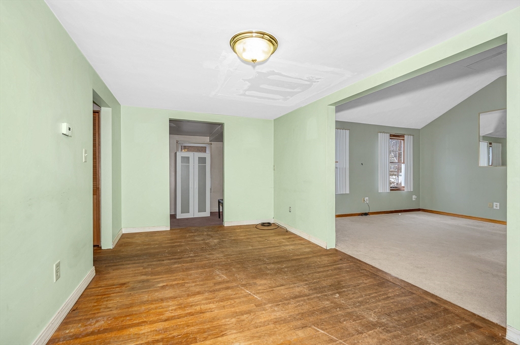 126 Groton Road Chelmsford, MA 01863 - Photo 6 of 38 a view of a room with a ceiling fan and window