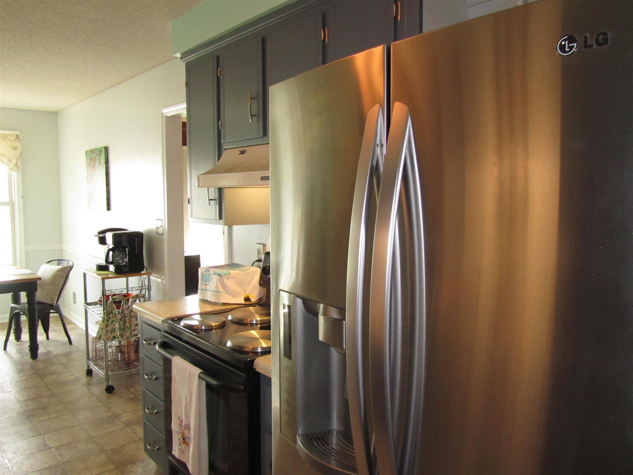 3507 Ott Wilson Road Springfield, TN 37172 - Photo 16 of 23 a kitchen with stainless steel appliances a refrigerator and a stove