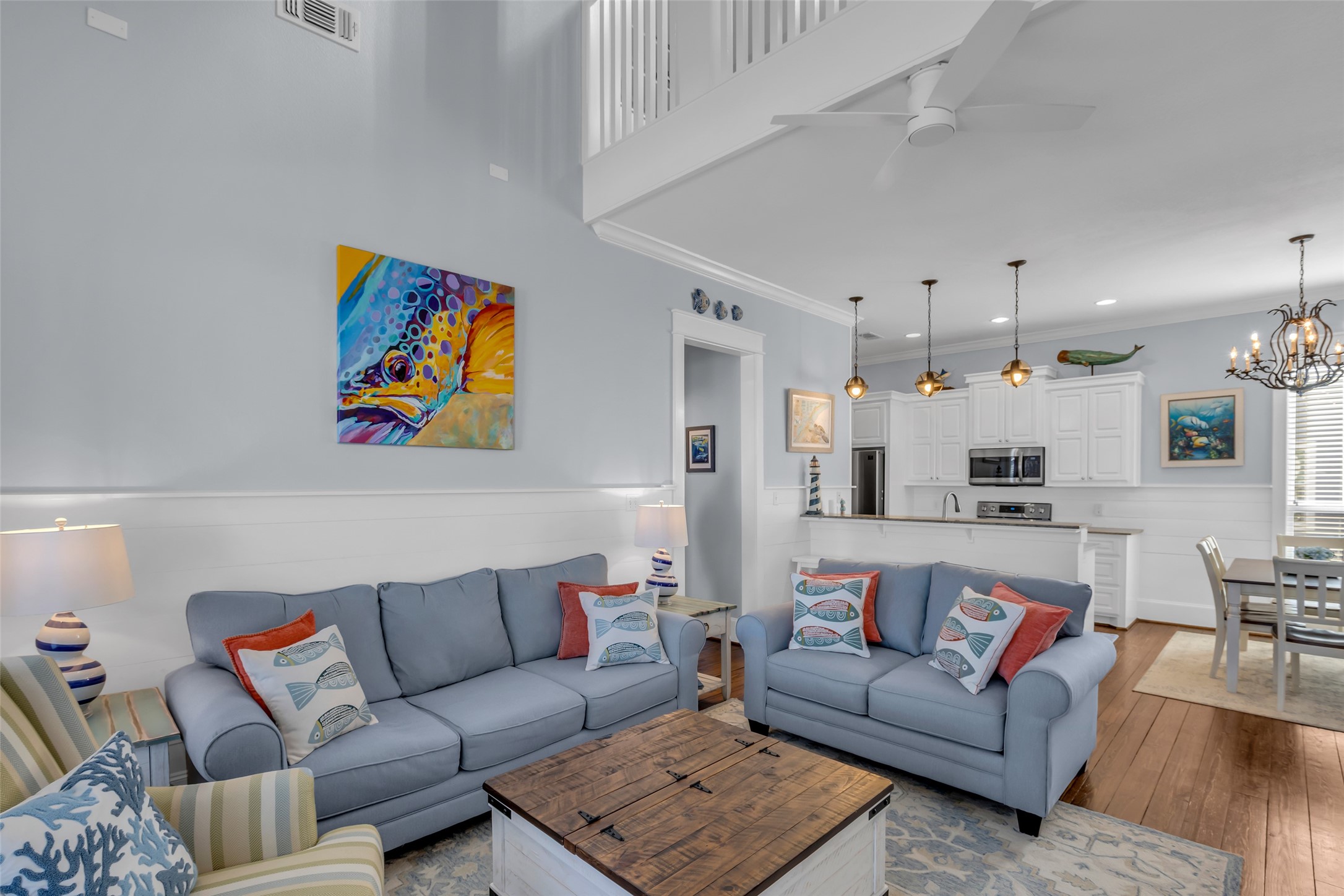 911 Tidelands Crystal Beach, TX 77650 - Photo 11 of 25 a living room with furniture kitchen view and a table