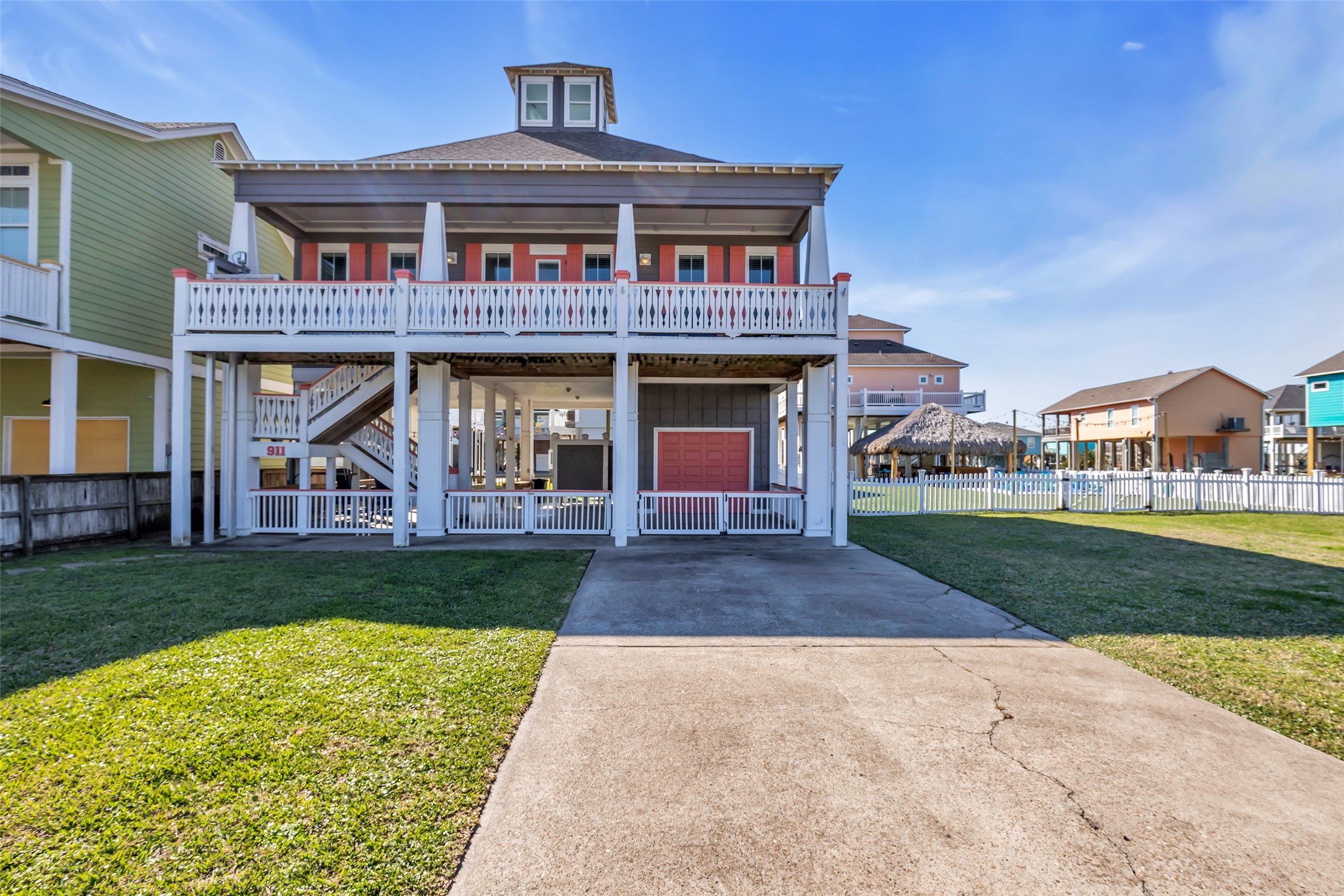 911 Tidelands Crystal Beach, TX 77650 - Photo 2 of 25 a front view of a house with garden
