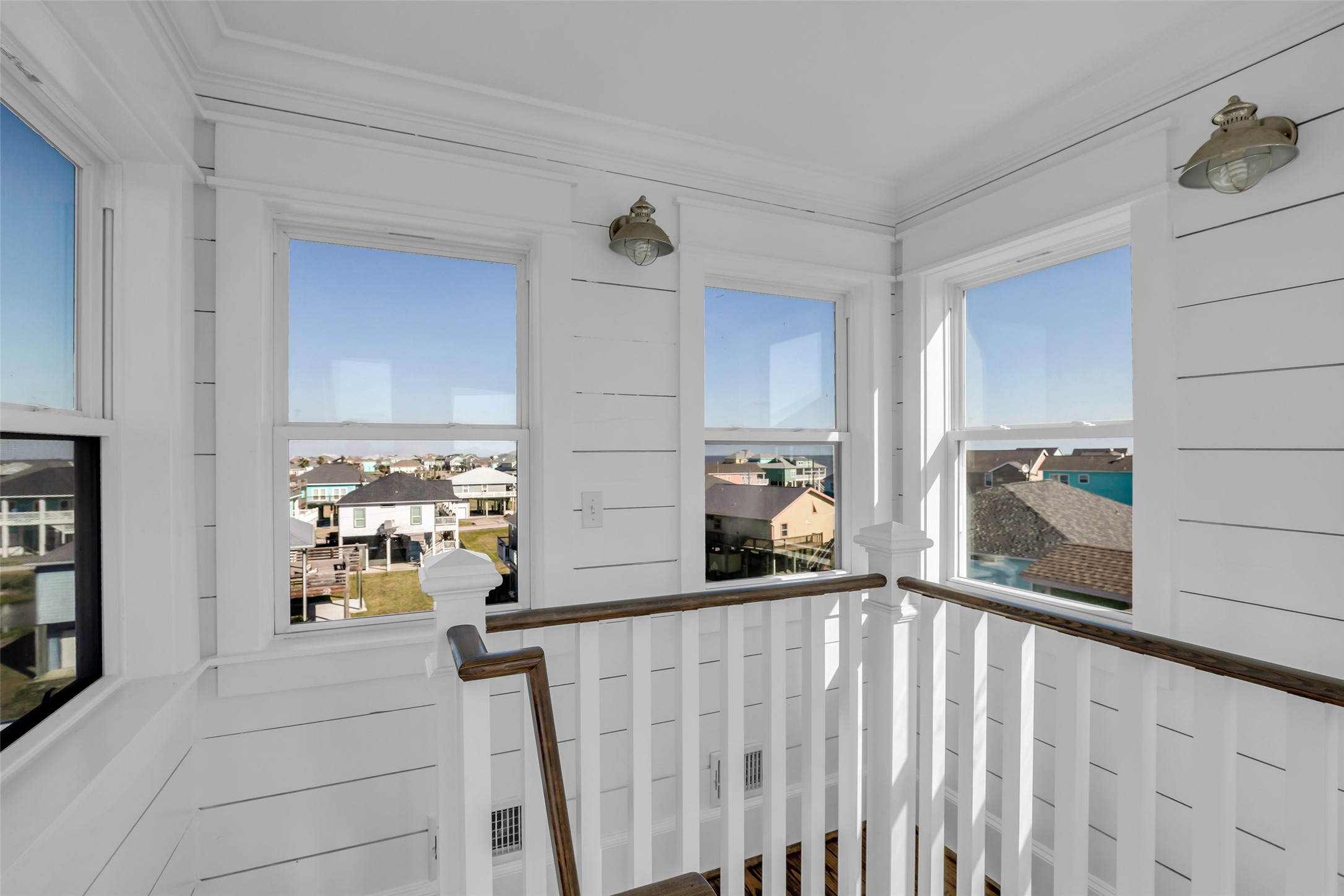 911 Tidelands Crystal Beach, TX 77650 - Photo 25 of 25 a kitchen with a refrigerator a stove and a cabinets