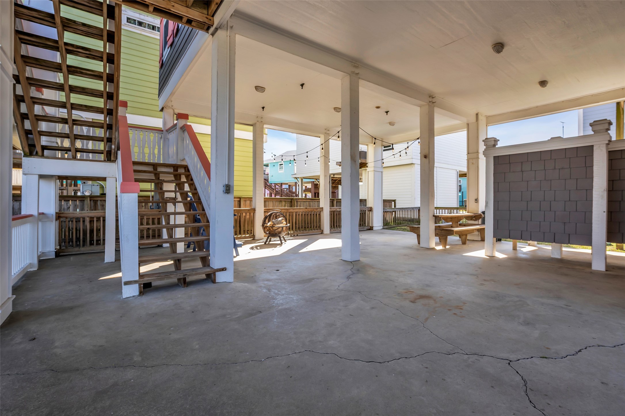 911 Tidelands Crystal Beach, TX 77650 - Photo 3 of 25 a view of game room with staircase