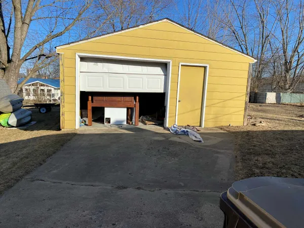 a front view of a house with yard