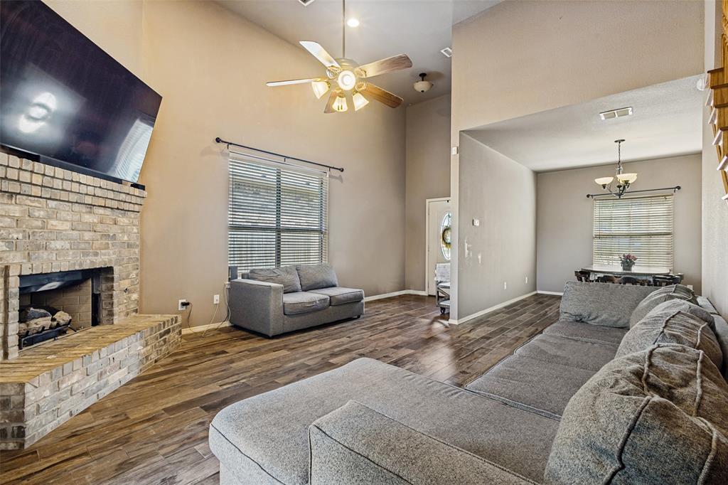 1 Pleasant Valley Sanger, TX 76266 - Photo 5 of 37 The living room has tall ceilings adding to its spacious feel.