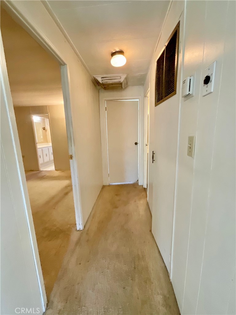 7282 Marin Street Nice, CA 95464 - Photo 54 of 69 a view of a hallway