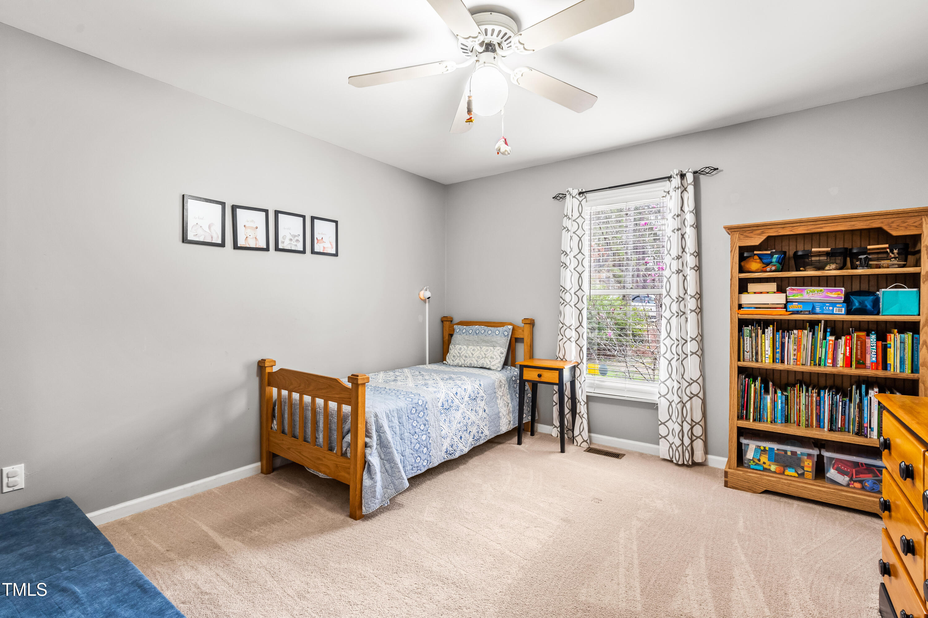 5216 Passenger Place Raleigh, NC 27603 - Photo 22 of 33 Another spacious bedroom with ceiling fan!
