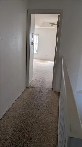 a view of a livingroom with a staircase