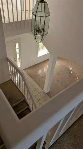 a view of empty room with windows