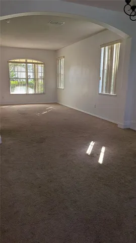 a view of a pathway both side of house