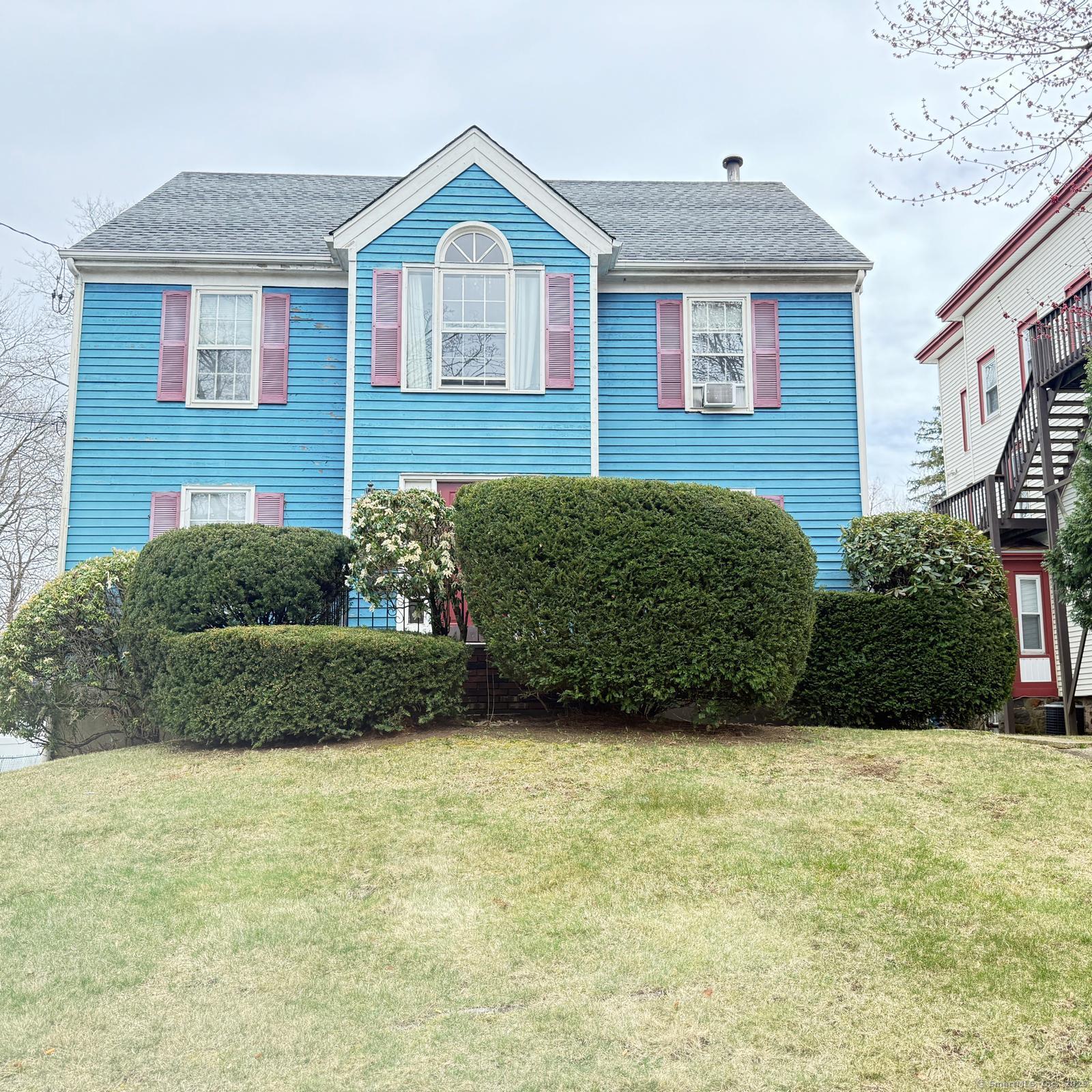 194 High Ridge Avenue Ridgefield, CT 06877 - Photo 1 of 1 a view of a front of a house with a yard