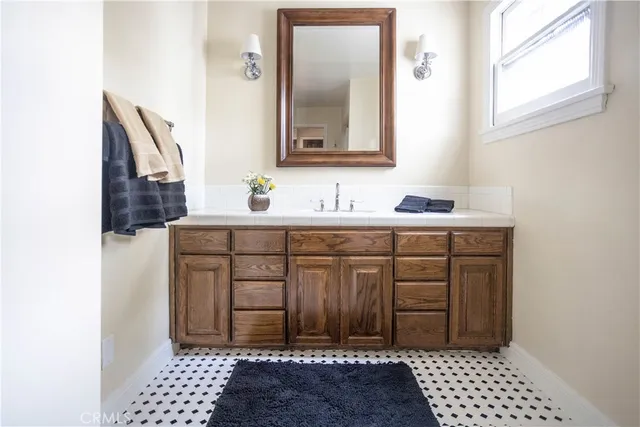 a view of a patio with couple of chairs and couches in a patio