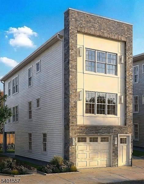 a front view of a house with large windows