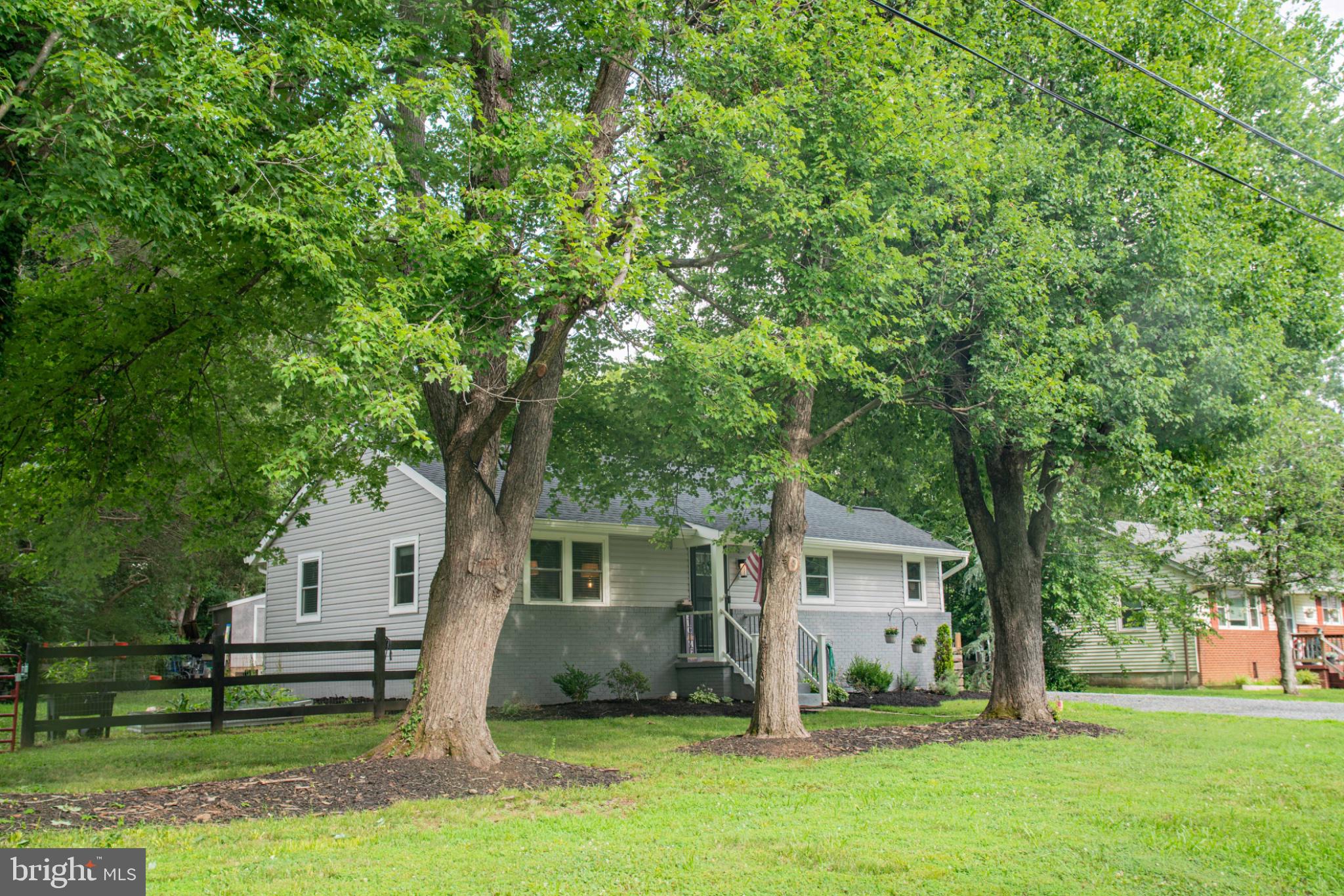 301 North Duey Road Remington, VA 22734 - Photo 38 of 38 Charming home embraced by lush trees.
