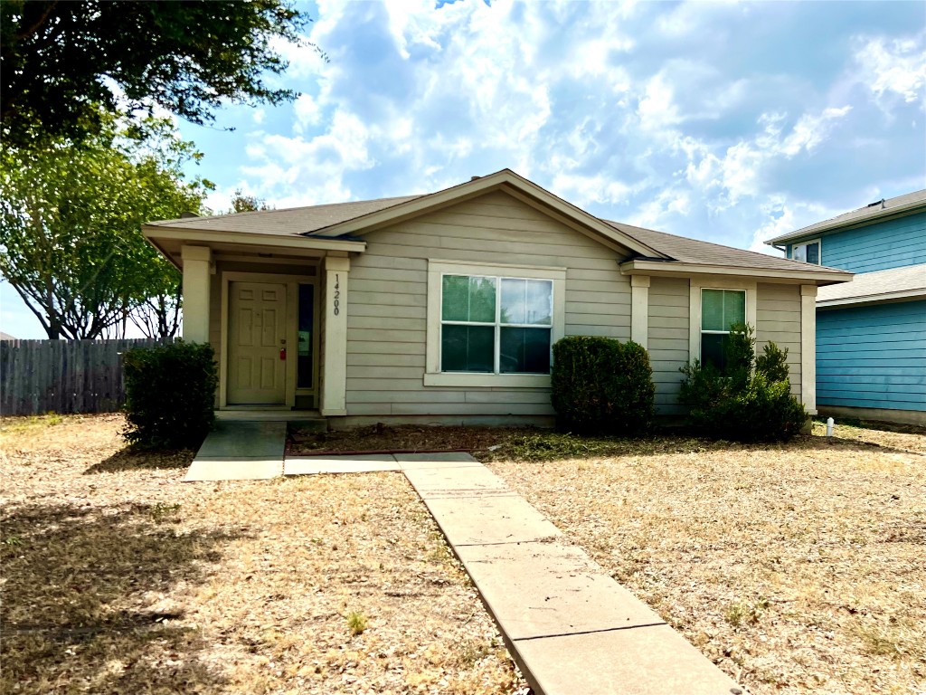 14200 Briarcreek Loop Manor, TX 78653 - Photo 1 of 20 a view of house with yard