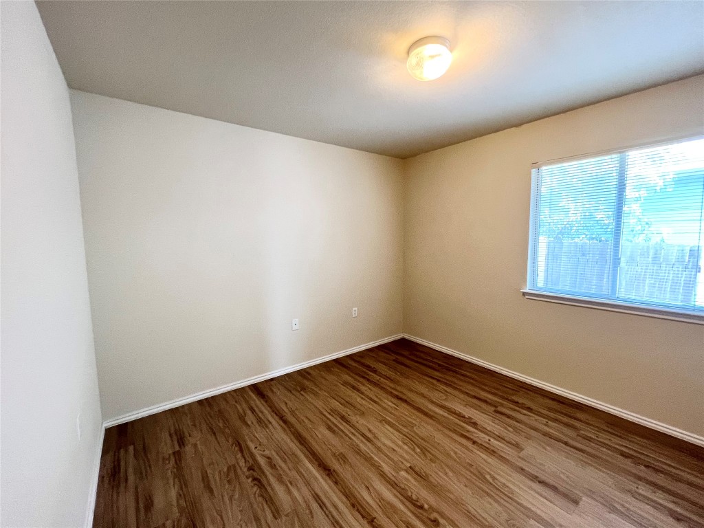 14200 Briarcreek Loop Manor, TX 78653 - Photo 3 of 20 wooden floor in a room