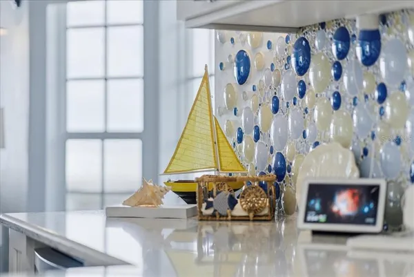 a living room with furniture wooden floor and a table