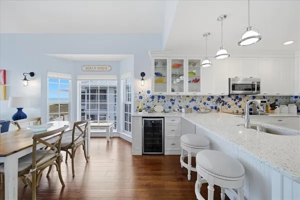 a living room with a couch and a large window