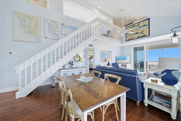 a view of a balcony with wooden floor