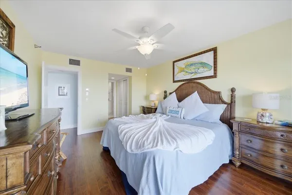 a bedroom with furniture and air hockey table