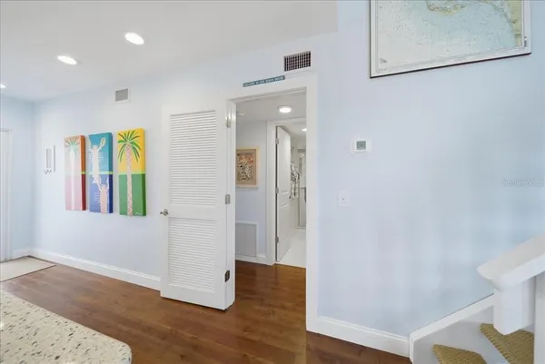 a view of a kitchen with sink washer and dryer