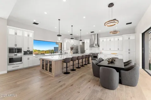 a view of sitting area with furniture and city view