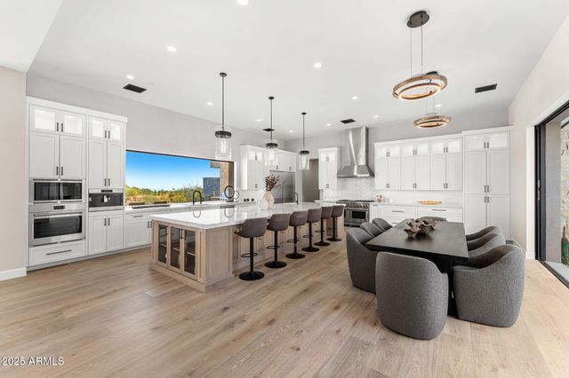 a view of sitting area with furniture and city view