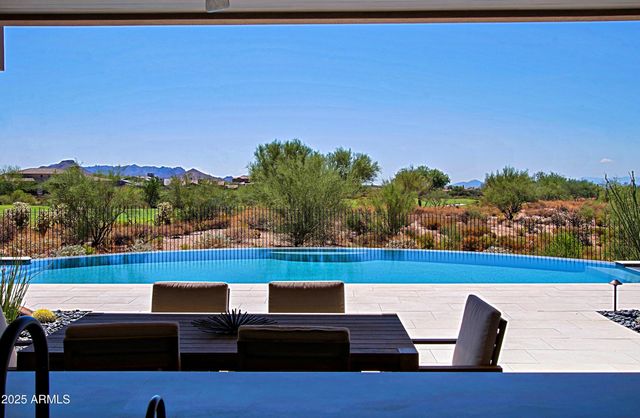 a view of a couch in a backyard