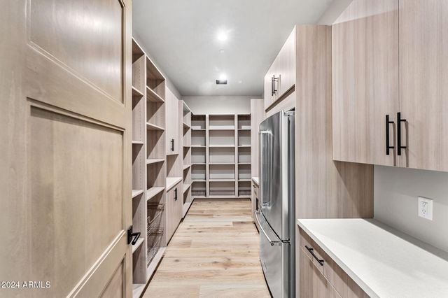 a outdoor dining space with furniture and city view