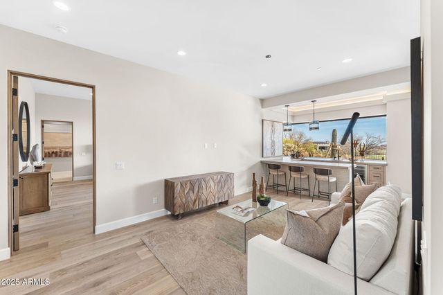 a view of a lake with a house in the background