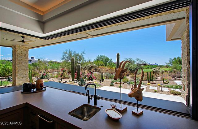 a spacious bedroom with a bed and a couch