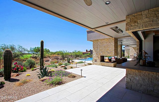 a bathroom with a double vanity sink toilet and shower