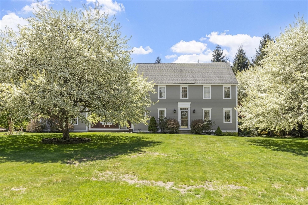 4 Ridge Road Pepperell, MA 01463 - Photo 4 of 42 a view of a house with a yard