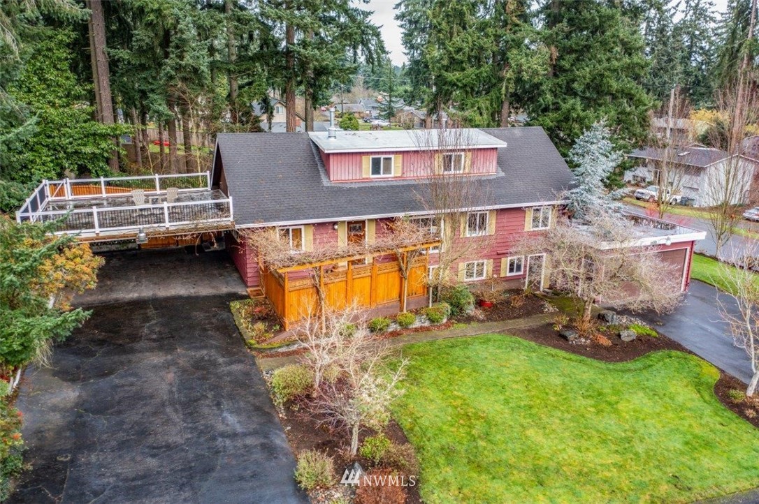5801 42nd Street West University Place, WA 98466 - Photo 1 of 34 a view of a house with backyard and sitting area