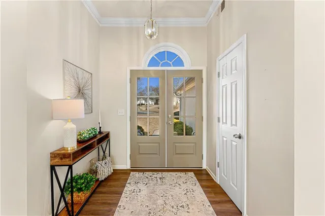 a living room with fireplace furniture and a flat screen tv