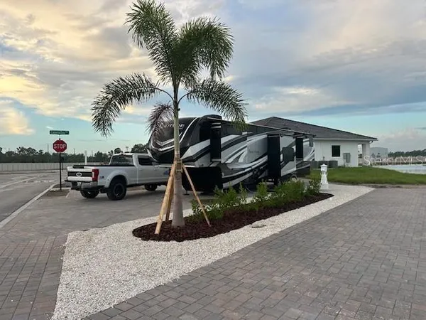 a view of a car park in front of house