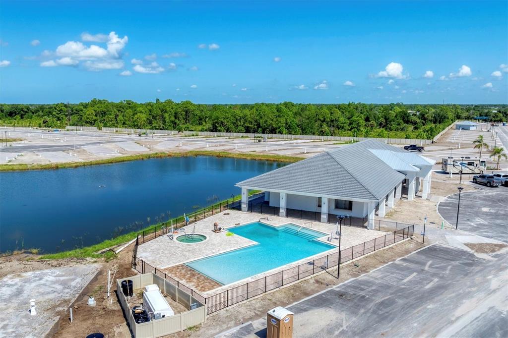 9001 Gasparilla Road, Unit 59 Placida, FL 33947 - Photo 54 of 77 an aerial view of a house with outdoor space and lake view