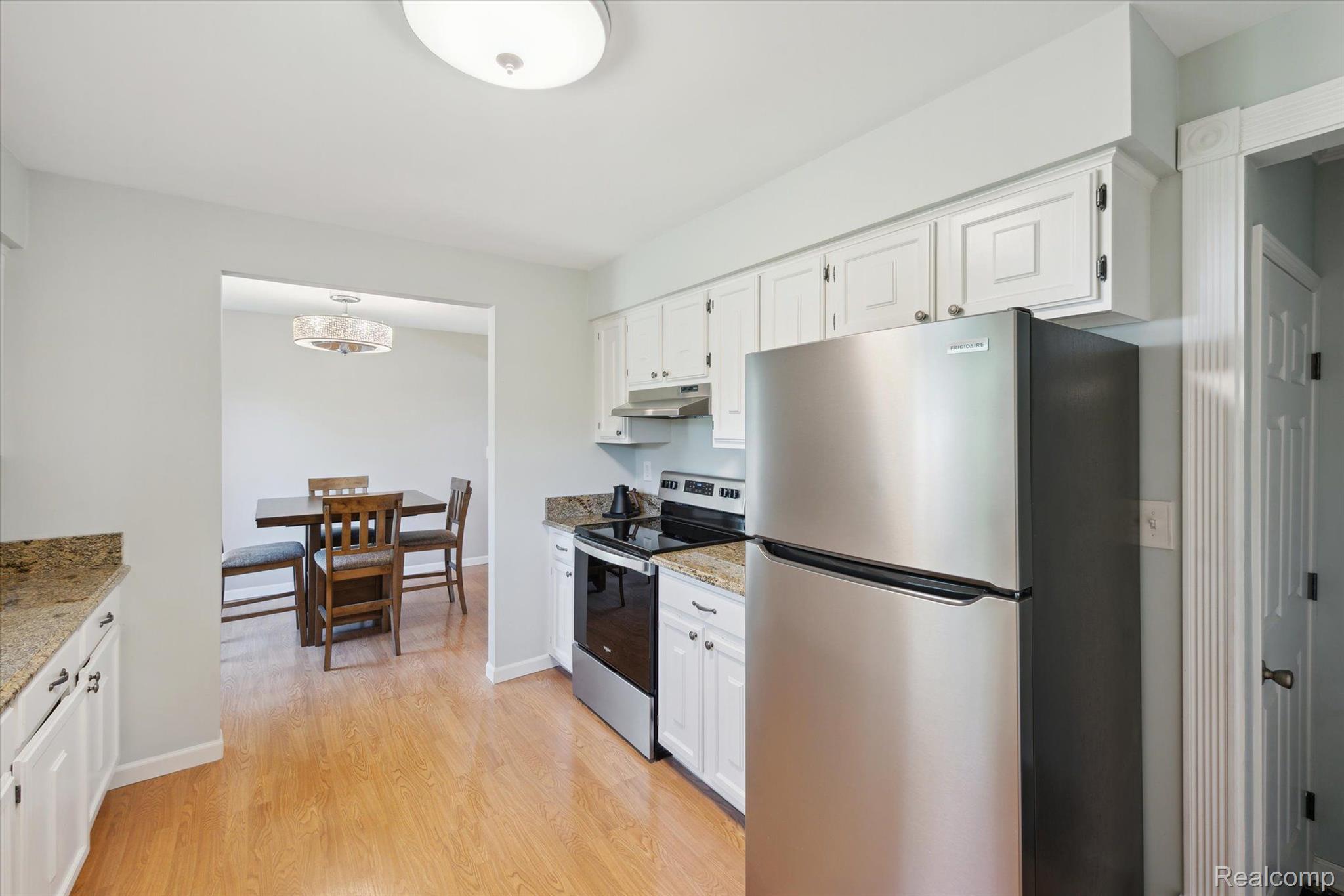 5307 North Seymour Road Flushing, MI 48433 - Photo 14 of 33 Modern kitchen with stainless appliances.