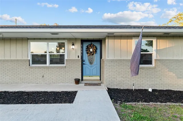 a view of a livingroom with a flat screen tv
