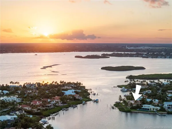a front view of a building with parking space