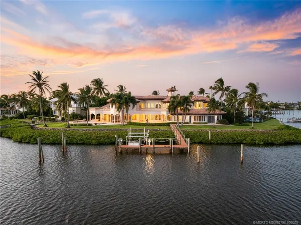 an view of a lake with houses